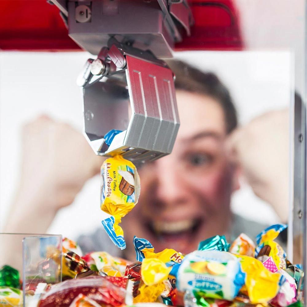 Земи бонбони или дозер за машина за играчки за грабање слатки или бонбони